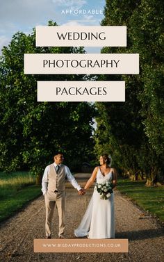 a bride and groom holding hands walking down a dirt road with trees in the background