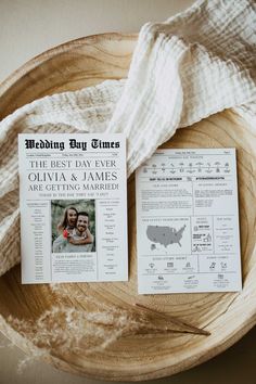 the best day ever wedding program is displayed on a wooden plate with a white blanket