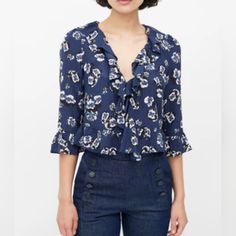 Realisation Par Blue Silk Floral Ruffled Blouse Size S Floral Print Pattern Ruffled Blouse, Ruffled V-Neck Single Snap Button Closure At Front ¾ Sleeves With Ruffled Cuffs Ruffled Hem Gathered Shoulders Navy / Midnight Blue Base With White And Black Floral Print Throughout Unlined Approximate Measurements (Laid Flat): Brand: Realisation Par Size: Small Color: Midnight Blue, Black, White, Red P2p: 17” Length: 16 ½” Sleeve: 17” Material: 100% Silk Condition: Pre-Owned; Excellent Pre-Loved Conditio Blue Office Blouse With Ruffles, Blue Ruffled Tops For Office, Formal Blue Floral Print Tops, Spring Office Wear Tops With Ruffles, Spring Office Wear Ruffled Blouse, Blue Ruffled Tops For Formal Occasions, Spring Office Wear Blouse With Ruffles, Formal Blue Ruffled Tops, Realisation Par