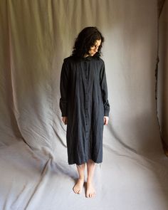 Woolen shirt dress PORTRAIT This dress is made of 100% natural high-quality medium weight wool in grey-black stripes color. The dress is soft and flattering, it also works as a duster, light coat or jacket, upon another dress or pants. It has small collar with unfinished edge, cuffs, side pockets. Buttons are made of hand dyed palm tree. Hem of the dress is unfinished. Cuffs are wide and have two buttons on each. Collar and cuffs are hand stitched with natural linen thread. All the materials are Vintage Shirt Dress, Gothic Jackets, Work Coat, Light Coat, Gothic Dress, Wool Dress, Black Stripes, Black Fashion, Models