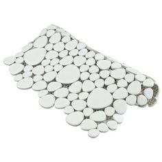 white pebbles are arranged on top of each other