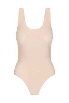 Description This Butter Tank Bodysuit features next-level softness and supreme stretch from European modal. It features an ultra-flattering fit and is finished with a raw-cut thong bottom. All About the Fit Fabric Feel (light) 1 2 3 4 (heavy) Fit (slimfit) 1 2 3 4 (loosefit) Fabric Details: Luxury Austrian modal blend (79% modal, 21% elastane) Fit-tested by real women Elastic-free construction Four way stretch and high recovery Pilling resistant Raw-cut edges Snap gusset closure Machine washable Second-skin Elastane Bodysuit For Loungewear, Smoothing Bodysuit For Loungewear, Elegant Seamless Bodysuit For Loungewear, Smoothing Bodysuit With Minimal Stretch For Loungewear, Seamless Soft Stretch Bodysuit, Elegant Elastane Bodysuit For Loungewear, Seamless Second-skin Bodysuit For Loungewear, Fitted Elastane Swimwear With Soft Touch, Compressive Elastane Bodysuit For Loungewear