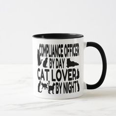 a black and white coffee mug that says public defender by day cat lover by night