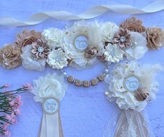 some flowers and ribbons on a table