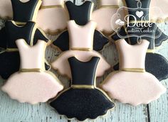 decorated cookies in the shape of ballet costumes