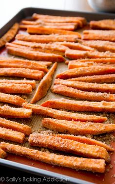 baked sweet potato sticks on a baking sheet