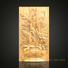 an intricate carved wooden panel with flowers and leaves