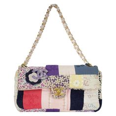 Chanel patchwork small classic flap bag Year: 2006 {VINTAGE 16 Years} Denim and cotton stitched patchwork CC eyelet and floral patch details Gold brushed hardware Classic interwoven cloth chain Zippered interior pocket Pink interior cotton lining Strap Drop: Single 8" Double 4" 6.5" H x 9" W x 2.55" D Made in Italy Tote Bag Pattern Free, Patchwork Tote Bags, Bag Pattern Free, Classic Flap Bag, Vanity Bag, Patchwork Bags, Patchwork Patterns, Tote Bag Pattern, Patchwork Designs