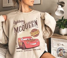 Vintage Cars Shirt Lightning McQueen Shirt Car Pixar Shirt, McQueen 1977 Cars Land Shirt Retro Disneyland

 	To discover what else I have that you'll like, browse the remainder of my store.
 	If your size doesn't appear to be in stock, please contact our store and we'll double-check our inventory.
 	WE WILL REPLY TO MESSAGES WITHIN 24 HOURS.

PREMIUM HIGH QUALITY

 	The shirts we print are Bella Canvas, Gildan and Next Level
 	Material: 4.2 oz./yd² (US) airlume combed and ring-spun cotton, lightweight yet soft and premium.
 	The tee is built to last with cover-stitched collar and sleeves, shoulder-to-shoulder taping, and side seams.
 	%100 quality cotton.
 	 Tear away label
 	Soft & Stylish
 	Very high-quality smooth print, we do not use cheap iron on transfers.

CARE INSTRUCTION:

 	Turn Lightning Mcqueen Shirt, Retro Disneyland, Cars Land, Vintage Disneyland, Car Shirts, Disney Sweatshirts, Lightning Mcqueen, Knitted Tank Top, Knit Tanks