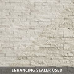 a white brick wall with the words enhance sealer used