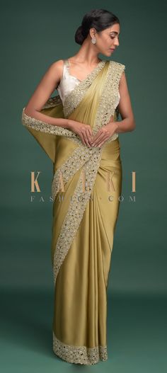 Buy Online from the link below. We ship worldwide (Free Shipping over US$100)  Click Anywhere to Tag Granola Gold Saree In Satin With Cut Work Border Adorned With Beads And Kundan Online - Kalki Fashion Granola gold saree in satin.Adorned with cut work on the border embellished with beads and kundan in round motifs Celebrity Saree, Saree Jacket, Saree Jacket Designs, Gold Saree, Saree Jackets, Jacket Designs, Asian Wedding Dress, Gorgeous Outfits