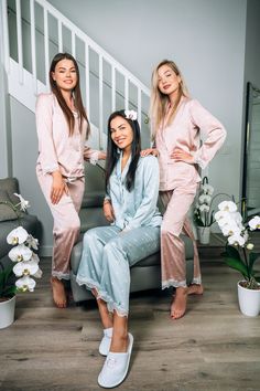 Elevate your evening unwind and sleep routine with our enchanting Floral Print Lace Satin Pajama Set, thoughtfully designed with Long Sleeves and Pants for those who cherish comfort without compromising on style. This set is a harmonious blend of luxurious softness and aesthetic allure, catering to any woman looking to add a splash of elegance to their nighttime wardrobe. Crafted from premium satin, this pajama set promises silky smoothness that gently caresses your skin, ensuring a blissful night's sleep or a serene lounge session at home. The gorgeous floral print boasts vibrant colors and delicate patterns, instantly uplifting your mood with its natural beauty. The long-sleeved top features intricate lace detailing along the cuffs, adding a sophisticated touch, while the matching pants Feminine Long Sleeve Lounging Sets, Elegant Long Loungewear Sets, Elegant Lounging Sets With Long Pants, Elegant Loungewear Sets, Feminine Long Sleeve Sleep Sets, Feminine Long Sleeve Sleepwear Set, Long Sleeve Lounging Set, Matching Sleepwear Set With Long Pants, Matching Sleep Set With Long Pants