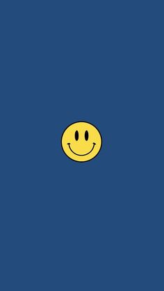 a yellow smiley face on a blue background