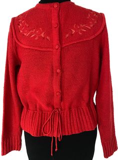 Vintage Wolford brand jacket in the style of a traditional Trachten jacket made from an acrylic/wool mix. Awesome bright red color with fabric-covered buttons and tone-on-tone machine-embroideries Size 38D / 40 EU / 10 UK see measurements (lying flat) below: 1/2 chest: 48 cm/19" 1/2 bottom shirt: 46 cm/18.25" shoulder across: 37 cm/14.5" sleeve length: 59 cm/23.25" full length from high shoulder point: 55 cm/21.75" If you have any further question, please contact me - I am always happy to help! Red Wool Knitted Outerwear, Red Fitted Cardigan With Button Closure, Fitted Knitted Red Outerwear, Fitted Red Sweater With Buttons, Red Embroidered Long Sleeve Cardigan, Red Wool Cardigan For Fall, Fitted Red Sweater With Button Closure, Traditional Red Cardigan For Winter, Traditional Red Winter Cardigan