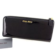 Rank Product name View of rank 6 Popular sale Miu Miu miu miu purse Wallet L letter zipper Women's Ribbon motif Black Gold series Enamel leather [Used] J21405 [10] New and unused items [9] Super beautiful goods with little feeling of use [8] There are some scratches. Stain There is a very good mint condition [7] There are some scratches. Stain There are good quality goods [6] Goods that can be used normally [5] Somewhat difficult [4] junk item Please consider as an approximate guide. Comment It Black Wallets With Logo Plaque For Everyday Use, Designer Evening Wallet With Zipper Closure, Black Evening Wallet With Logo Plaque, Everyday Wallets With Logo Plaque, Designer Evening Wallets With Logo Plaque, Miu Miu Purse, Miu Miu Wallet, L Letter, Black Leather Wallet