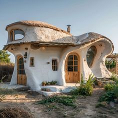 an unusual looking house in the middle of nowhere