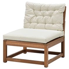 a wooden chair with a white cushion on it