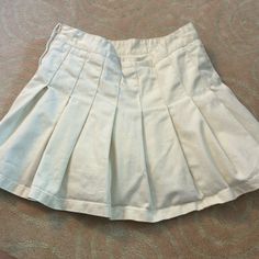 In Excellent Condition, Never Worn. Has Under Shorts In The Skirt. From Brandy Melville White Cotton Skort With Short Inseam, White Casual Mini Skirt With Short Inseam, Casual White Mini Skirt With Short Inseam, Spring Cotton Tennis Skirt With Short Inseam, Fitted Short Inseam Skirt For Day Out, Fitted Skirt With Short Inseam For Day Out, Cotton Lined Short Skirt Bottoms, Casual Short Inseam Skirt For Spring, Spring Cotton Tennis Skirt