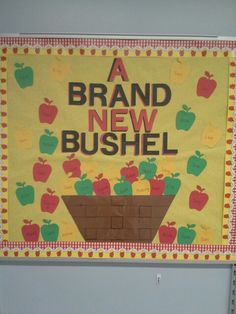 a bulletin board with an apple bushel on it and the words a brand new bushel