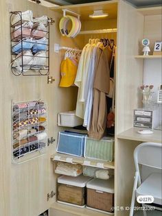 an organized closet with clothes and other items