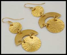 Lots of shimmer and movement! Hand cut from bronze sheet. Textured with hammers and brushes. Textured gold-plated connector rings. Light in weight, earrings are about 2 3/4 inches in length, inc hand forged 14t gold-filled french wires. Metal Art Jewelry, Pewter Earrings, Ginkgo Leaves, Bridesmaid Bags, Precious Metal Clay, Ginkgo Leaf, Paper Jewelry, Brass Jewelry, Enamel Jewelry