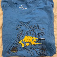 Nwt Nike Mens Medium Athleisure Tee Casual Sports Polo Shirt, Sports Shirt With Blue Logo Print, Blue Moisture-wicking Summer Shirt, Blue Sports Shirt With Graphic Print, Blue Graphic Print Sports Shirt, Sporty Blue Shirt With Graphic Print, Sporty Blue Summer Shirt, Nike Blue Shirt With Graphic Print, Blue Moisture-wicking Graphic Tee