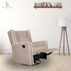 the recliner chair is in front of a bookshelf