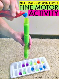 a child is playing with a fine motor activity