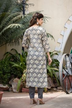 This is a 3-piece set. The set consists of straight cut print, zari & mirror embroidered kurta has keyhole neck, 3/4th sleeves, calf length teamed with trouser pants with side pockets and a dupatta. 3-piece set Color-Grey Fabric-Modal Silk Kurta Length-Calf Length Sleeves-3/4th Sleeves Neck-Keyhole Neck Work-Printed, zari & mirror embroidery with front tassels Washing Care-Regular Wash or Machine Wash Mirror Embroidery, Embroidered Suit, Keyhole Neck, Suit Set, Trouser Pants, Grey Fabric, Straight Cut, Silk Printing, Gray Color