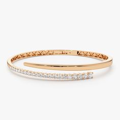 ✥ The Round Cut Diamond Bracelet Bangle in 14K Gold is a luxurious and elegant accessory that adds a touch of glamour to any ensemble. Crafted from high-quality 14K gold, this bracelet bangle features a classic and timeless design with dazzling round-cut diamonds set along the band. The diamonds are carefully selected for their clarity and brilliance, creating a sparkling effect that catches the light from every angle. The bangle design ensures a comfortable fit, making it perfect for everyday w Luxury Diamond Cut Round Bangle, Luxury Gold Bracelet With Single Diamond For Gift, Luxury Brilliant-cut Bangle For Formal Occasions, Luxury American Diamond Elegant Bangle, Luxury Oval Gold Bracelet For Anniversary, Luxury Single Cut Diamond Engagement Bangle, Luxury Rose Gold Bangle With Diamond Cut, Luxury Rose Gold Bracelets With Single Diamond, Gold Diamond Bangles