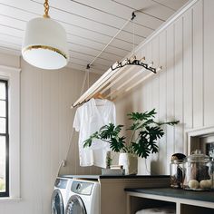 the laundry room is clean and ready to be used as a place for washing clothes