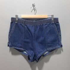 "Vintage 1970s elastic waist booty shorts/hot pants by Foreign Legion Made in U.S.A Indigo blue denim with contrast stitching Tag sz. M Measurements (in inches) taken flat: Waistband:16\"-18\" Hips: 19.5\" Front Rise: 13.5\" Back Rise: 16\" Inseam: 2\" Condition: Elastic has deteriorated due to age and so lacks the stretch it once would have had. In otherwise excellent condition" Denim Hot Pants, Hot Pants Shorts, Foreign Legion, Indigo Blue, Vintage 1970s, Short Outfits, Blue Denim, Casual Shorts, 1970s