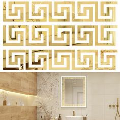 the bathroom is decorated in gold and white colors with an intricate pattern on the wall