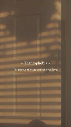 there is a quote on the wall that says, thantophobia - the phobia of losing someone you love