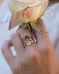 D E T A I L S — METAL: Gold Plated 18k: Gold plated jewelry has a layer of gold covering a base metal. — Stone: MOONSTONE & LAPIS LAZULI. 💎 The gemstones are the MOONSTONE & LAPIS LAZULI. ✦ Moonstone is a stone that brings hope, enhances feminine energies, sensitivity, intuition, and psychic abilities. It is also said to bring strong energies of abundance to one's life.Moonstone is a stone of protection, especially during childbirth, pregnancy, and travel at sea. It is a stone of calm a Feminine Energy, Crystal Rings, Our Body, Base Metal, Metal Bands, Gold Plated Jewelry, Jewelry Plate, Black Onyx, Lapis Lazuli