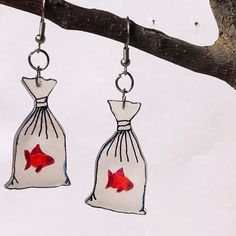 Here are some unique earrings with fish in bags. No animals were hurt in the making. lol. Handmade Fish-shaped Earrings For Gifts, Fish In A Bag, Unique Earrings, A Bag, Jewelry Earrings Dangle, Etsy Earrings, It Hurts, Dangle Drop Earrings, Dangle Earrings