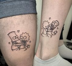 two people with matching tattoos on their legs