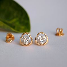 Pretty little earrings that will match perfect with any dress formal or casual These minimal earrings are also perfect for a minimal bridal look * Diamond Weight : 0.23 ct * Color-Purity : H Color, Vs-Si Purity * Gold - 1.75 gm, 14K Solid Yellow Gold (Approx) * Type - Screw back * Piercing Required Find us on Instagram for exquisite designs: @abhikajewels Like us on Facebook: www.facebook.com/Abhikajewels Thank you for visiting our shop.. :) 14k Gold Cluster Diamond Earrings For Anniversary, Gold Cluster Earrings With Halo Setting For Wedding, Yellow Gold Cluster Earrings With Halo For Anniversary, 14k Gold Diamond Halo Earrings For Wedding, 14k Gold Halo Diamond Earrings For Wedding, Yellow Gold Halo Cluster Earrings For Anniversary, Yellow Gold Halo Cluster Earrings For Wedding, 14k Gold Earrings With Halo Setting For Wedding, Elegant Cluster Diamond Earrings In 14k Gold