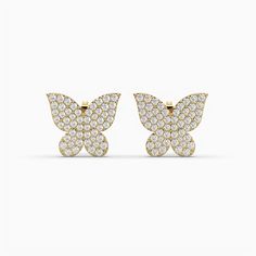 Item Code ShortButterfly Metal Type Gold Metal Karat 14/18 kt Diamond Natural Diamond Shape Butterfly Diamond Ct 1.03 ct Diamond Color FG Diamond Clarity SI+ Earring Length 0.50 in Earring Width 1.7mm Embrace the beauty of nature with our Diamond Butterfly Stud Earrings in 14k & 18k Gold. These delightful and whimsical earrings seamlessly blend elegance with a touch of nature-inspired charm, making them a captivating addition to any jewelry collection.Design and Details:Butterfly-Inspired: The e Butterfly-shaped Yellow Gold Anniversary Earrings, Yellow Gold Butterfly Earrings For Anniversary, Butterfly-shaped Yellow Gold Earrings For Anniversary, Luxury Yellow Gold Butterfly Earrings, Yellow Gold Cubic Zirconia Butterfly Earrings, Diamond Butterfly Earrings Fine Jewelry, Yellow Gold Butterfly Earrings With Cubic Zirconia, Formal Butterfly Diamond Earrings, Diamond Butterfly Earrings For Anniversary