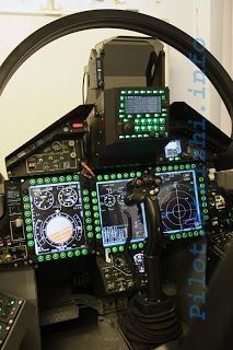 the cockpit of an airplane with multiple controls