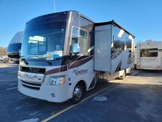 a motor home parked in a parking lot