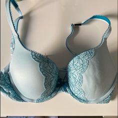 Light Blue Lace Victoria Secret Push-Up Bra Elegant Fitted Blue Bra, Elegant Light Blue Bra, Fitted Blue Bra With Padded Cups, Elegant Light Blue Bra With Padded Cups, Elegant Blue Stretch Bra, Elegant Light Blue Padded Bra, Elegant Blue Bra For Spring, Elegant Blue Spring Bra, Victoria's Secret Stretch Blue Bra