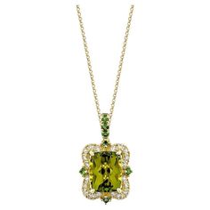 This collection features a selection of the most Olivia hue peridot gemstone. Uniquely designed this pendant with tsavorite and diamonds in Yellow gold to present a rich and regal look. Peridot Pendant in 18Karat Yellow Gold with Tsavorite and Diamond. Peridot: 3.86 carat, 10X8mm size, cushion shape. Tsavorite: 0.08 carat, 1.60mm size, round shape. Tsavorite: 0.08 carat, 1.60mm size, round shape. White Diamond: 0.26 carat, 1.50mm size, round shape, G color, VS clarity. Gold: 3.251g, 18Karat Yell Luxury Tsavorite Emerald Necklace In Yellow Gold, Luxury Gold Tsavorite Necklaces, Luxury Tsavorite Necklace, Luxury Formal Peridot Necklace, Luxury Tsavorite Necklaces, Luxury Peridot Necklace, Luxury Gold Peridot Necklaces, Peridot Pendant, Peridot Gemstone