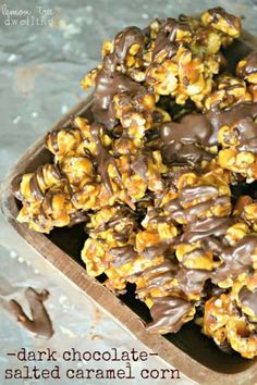 chocolate caramel popcorn clusters in a wooden tray with text overlay that reads dark chocolate salted caramel popcorn