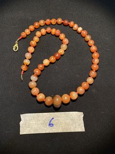 The orange color carnelian beads from my collections of ancient beads. The origin of this beads from India although the carnelian agate can be found in Pakistan Nepal and Afghanistan as well There is much or less white patina on almost every beads which shows this agate was undergrounded for many years small agate beads used as counter beads best gift for the people who collect ancient beads and best for the people who study ancient history we provide fast and free shipping to our customers by w Ancient Beads, Rare Beads, Carnelian Agate, Beaded Jewelry Necklaces, Carnelian Beads, Agate Bracelet, Banded Agate, Agate Necklace, Photo Bracelet