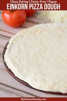 a pizza dough on a cutting board with tomatoes in the background and text overlay that says no rise pizza dough