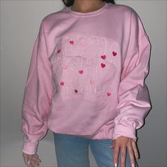 This baby pink or sand crewneck will have your sorority spelled out in a full front embroidered design surrounded with hearts (& love!), just pick your size, color and sorority and we will take care of the rest! <3 ***Due to nationwide stock shortages, we have several different manufacturers for our pink crews. The color, weight, and specs are similar on all of them. *Model is wearing a size XL for an oversized fit Size Chart: Personalized Pink Casual Sweatshirt, Personalized Pink Crew Neck Sweatshirt, Surrounded By Love, Pink Crewneck, Embroidered Design, Sorority, Baby Pink, Take Care, Graphic Sweatshirt