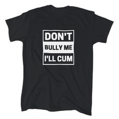 Express Your Humorous Side With This Classic Black Gildan T-Shirt Featuring The Funny And Sarcastic Message "Don't Bully Me I'll Cum." The Regular Fit And Crew Neckline Make It Comfortable To Wear For Any Occasion. Made Of High-Quality Cotton Material, This Tee Is Perfect As A Gift Or For Personal Use. Its Versatile Style Makes It Suitable For Men Of All Ages, Making It A Must-Have Addition To Any Wardrobe. Dont Bully Me Ill Cum Header, Funny Black Slogan Top, Funny Black Tops With Slogan, Cotton T-shirt With Black Letter Print, Black Cotton T-shirt With Letter Print, Funny Black Screen Printed Top, Funny Black Screen Print Top, Short Sleeve Band Merch Shirt With Funny Text, Funny Black Shirt With Letter Print