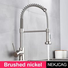 a kitchen faucet with the words brushed nickel next to it