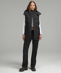 This Wonderfully Warm Down Puffer Has A Cinchable Waist And Hem That Lets You Customize The Shape And Keep Out Cold Drafts. Designed For Casual. Relaxed Fit Feels Roomy And Can Be Worn Over Larger Layers. Size Down If You Prefer A Slimmer Fit. Zippered Exterior Pockets With A Hidden Phone Sleeve. Interior Pockets Hold The Essentials. Removable Hood. Cinch The Interior Waist And Hem Drawcord To Customize Your Fit. | Wunder Puff 600-Down-Fill Mid-Length Vest Lululemon Vest, Long Vest, Warm Down, Vest Designs, Long Vests, Black Vest, Women's Coats & Jackets, Women's Coats, Leggings Shop